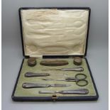 A cased silver manicure set, Sheffield and Birmingham marks for 1918