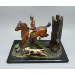 A painted huntsman and hound table lighter, base 15cm