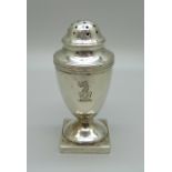 A Victorian silver pepperette with crest, Birmingham 1882, George Unite, 40g