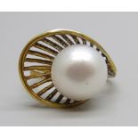 A silver gilt and pearl ring, S