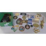 A collection of assorted items including patches, badges, medallions, cigarette cards, etc.