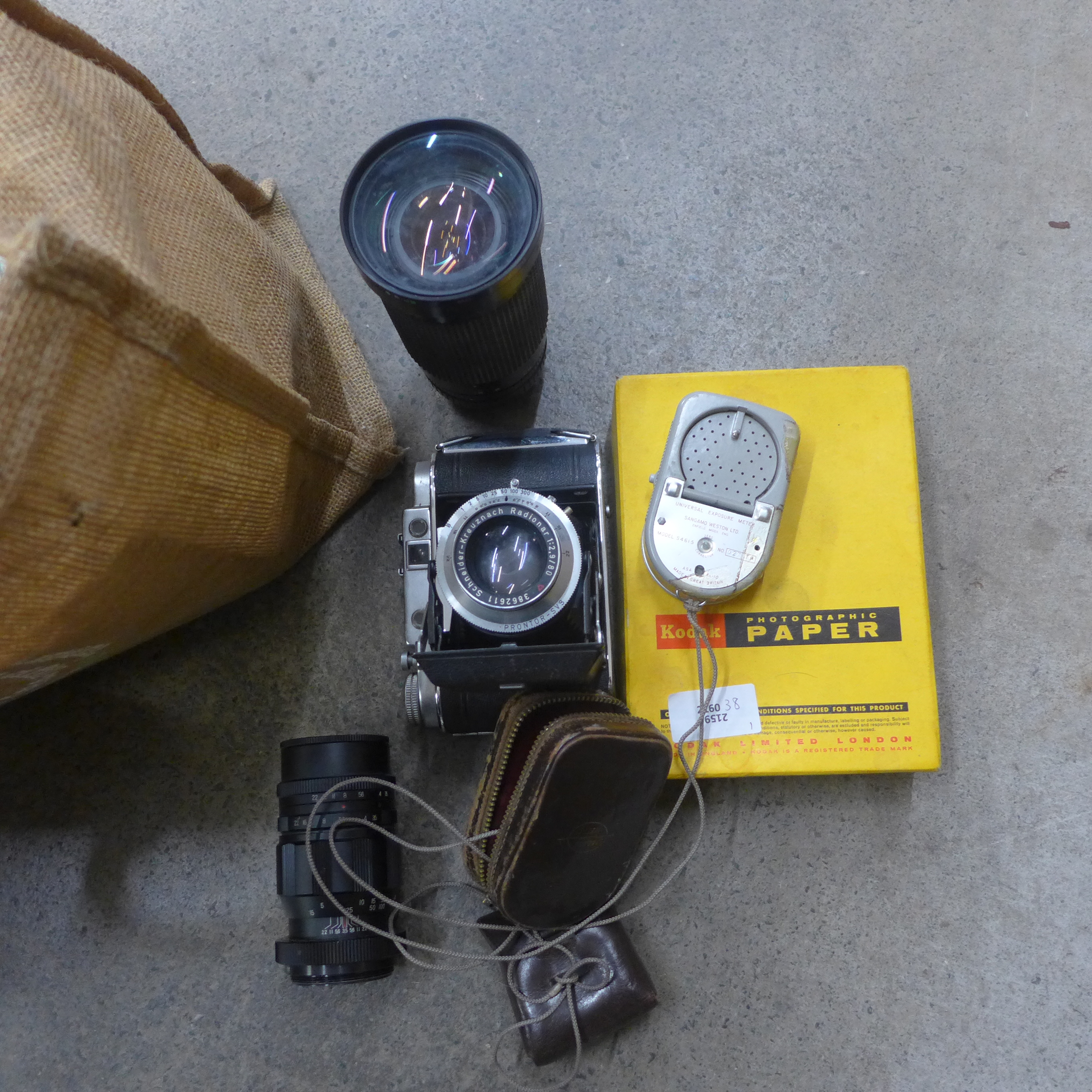 A vintage camera, two lenses and accessories - Image 3 of 3