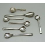 A silver napkin holder (marks in bowls), silver salt spoons and a mustard spoon, 40g