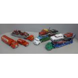 Die-cast model vehicles; two car transporters, one other transporter and Dinky and Corgi model