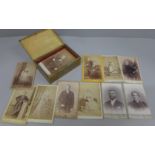 A tin containing 31 cabinet cards