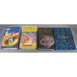 Four hardback books by J.K. Rowling; first editions of Harry Potter and the Order of the Phoenix (
