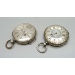 A silver fob watch with silver dial and raised gold Roman numerals and one other silver early