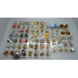 Fifty four pairs of clip on earrings