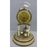 A German anniversary clock with glass dome