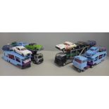 Die-cast model vehicles; four car transporters with Dinky and Corgi model vehicles, some restored
