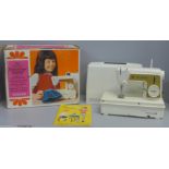 A Singer Little Golden Panoramic sewing machine, boxed