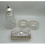 A silver topped sugar shaker, a pair of silver topped glass salts and a silver lidded glass dish