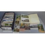 A collection of over 300 early to mid 20th Century postcards with handwritten journal of Trip to