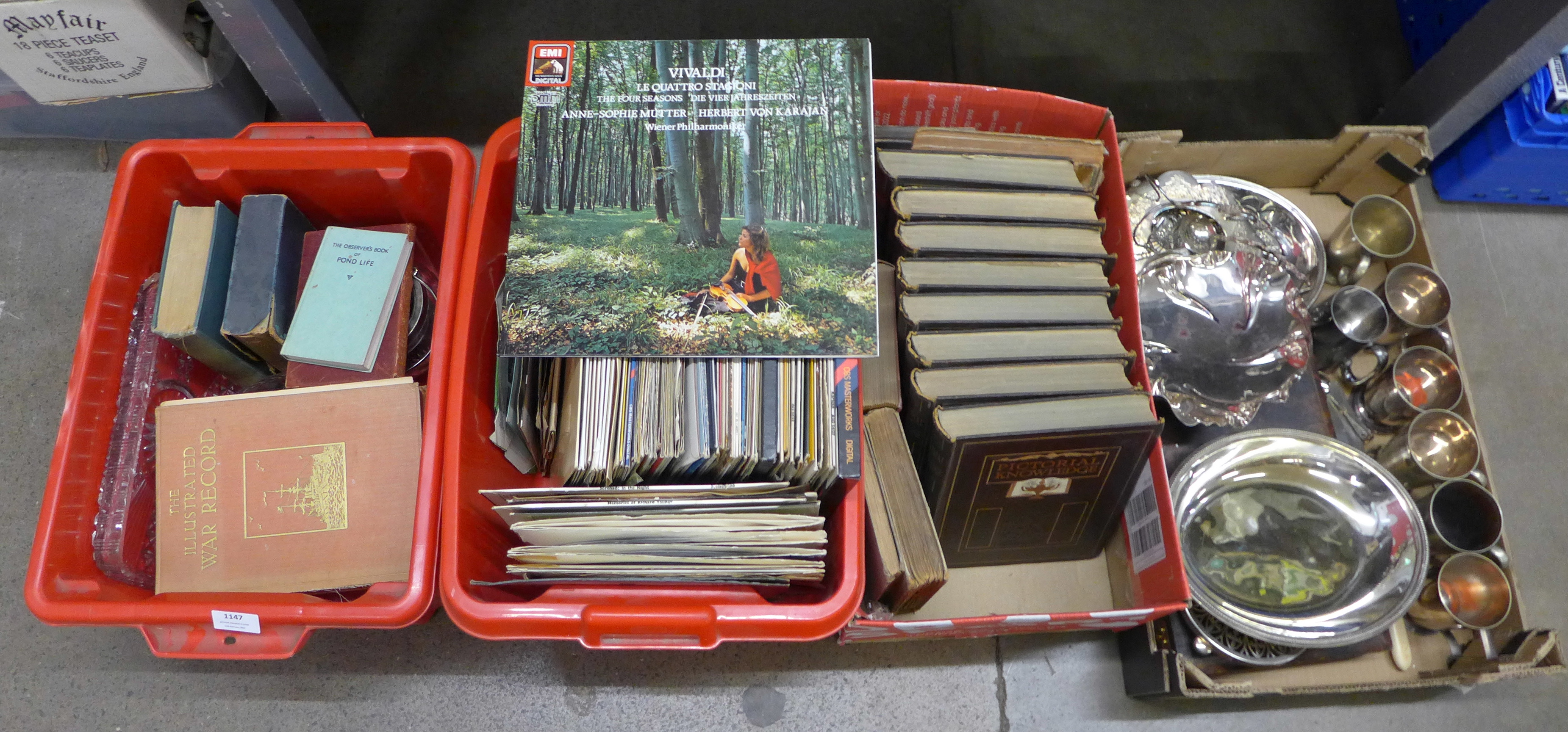 A box of silver plate, LP records and 7" singles and books, including Pictorial Knowledge and