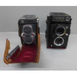 A Yashica Mat-124G medium format TLR camera and one other Yashica 44 camera