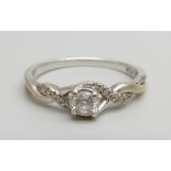 An 18ct white gold diamond set ring, 0.4carat weight, marked on the shank, 3.6g, S