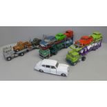 Die-cast model vehicles; three car transporters with Dinky and Corgi model vehicles, restored and