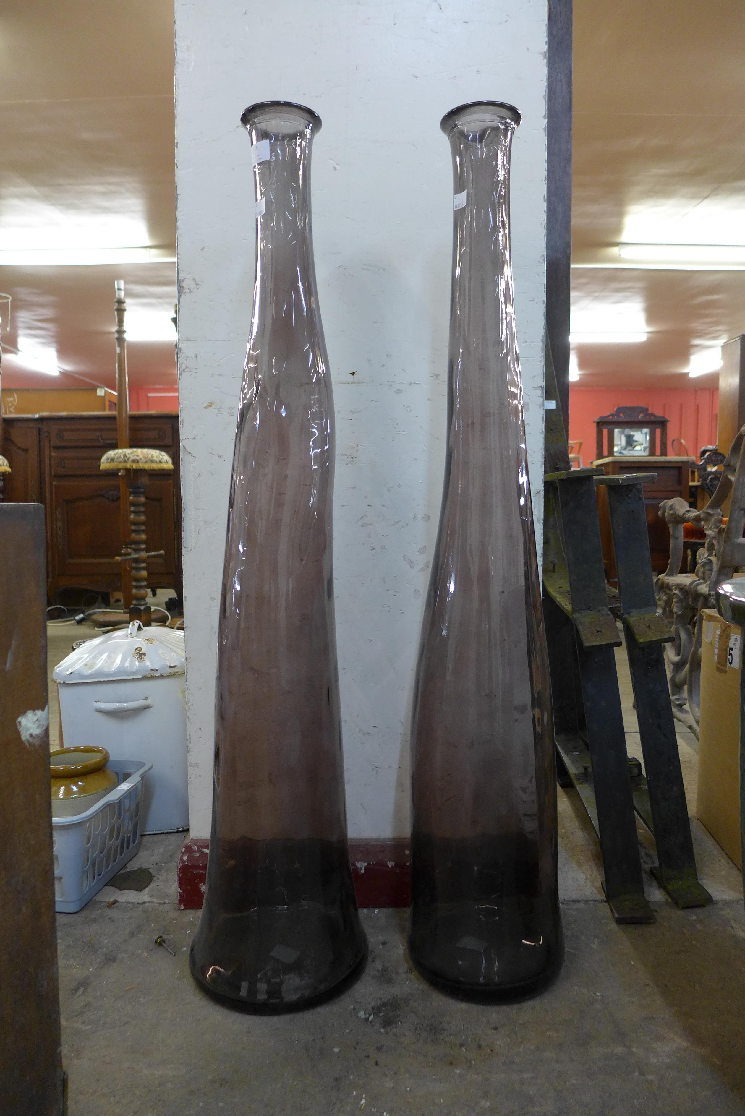 A pair of large studio glass vases