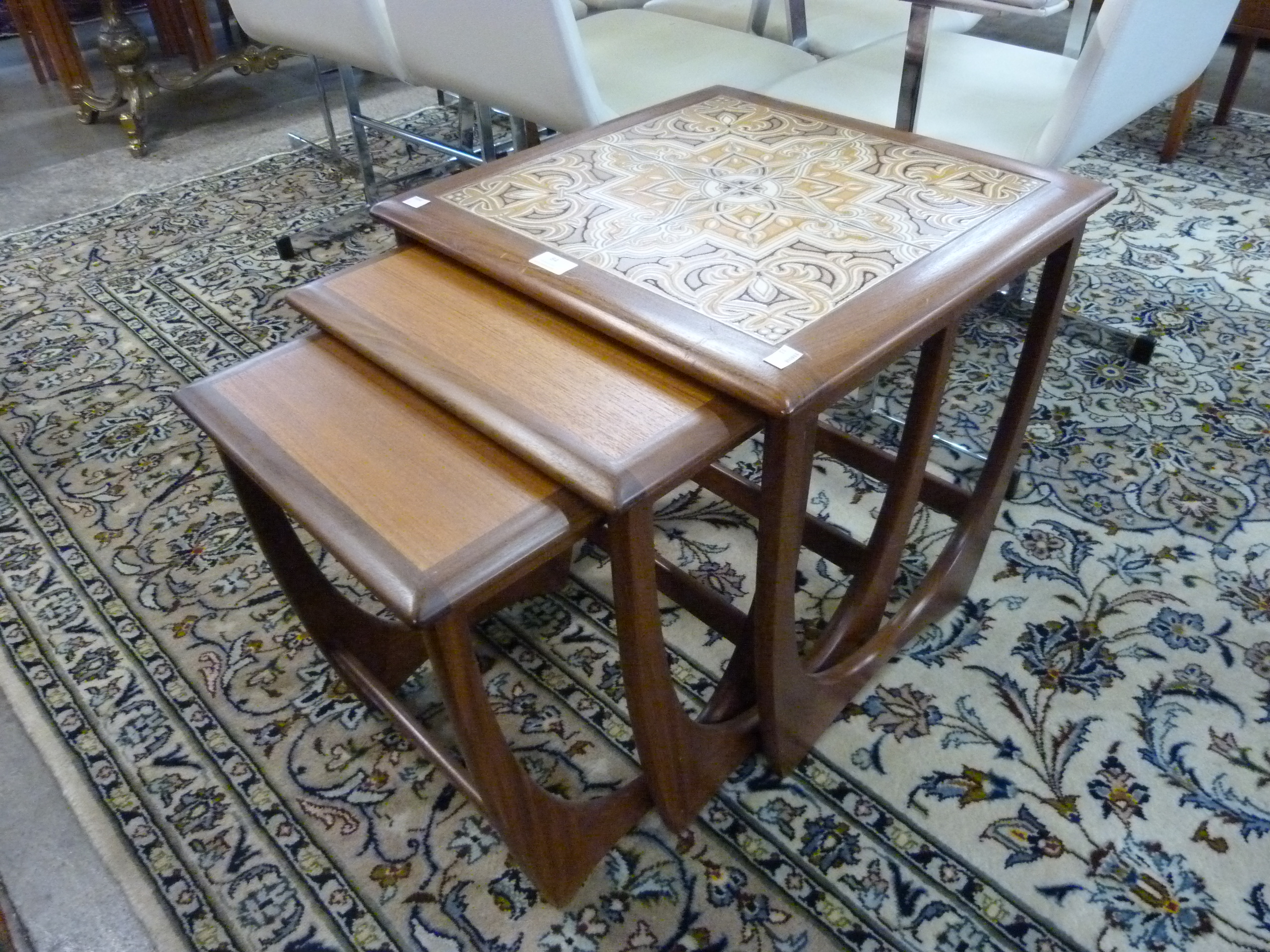 A G-Plan Astro teak and tiled top nest of tables