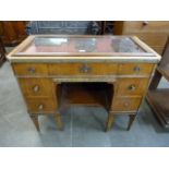 A French Empire style mahogany bijouterie table