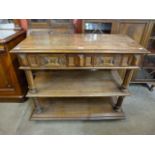 A 19th Century French chestnut three tier buffet sideboard