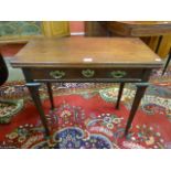 A George II mahogany fold over rectangular single drawer tea table