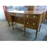 A Regency inlaid mahogany bow front sideboard