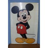 A Mickey Mouse print on board