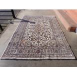 A Persian cream ground Kashan rug, 295 x 200cms, a/f