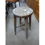 A Victorian oak kitchen stool