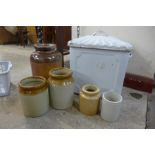 An enamelled bread bin and assorted glazed stoneware jars