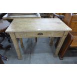 A Victorian waxed pine single drawer kitchen table