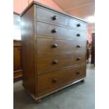 A Victorian scumbled pine chest of drawers