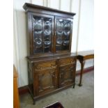 A 17th Century style carved oak geometric moulded bookcase