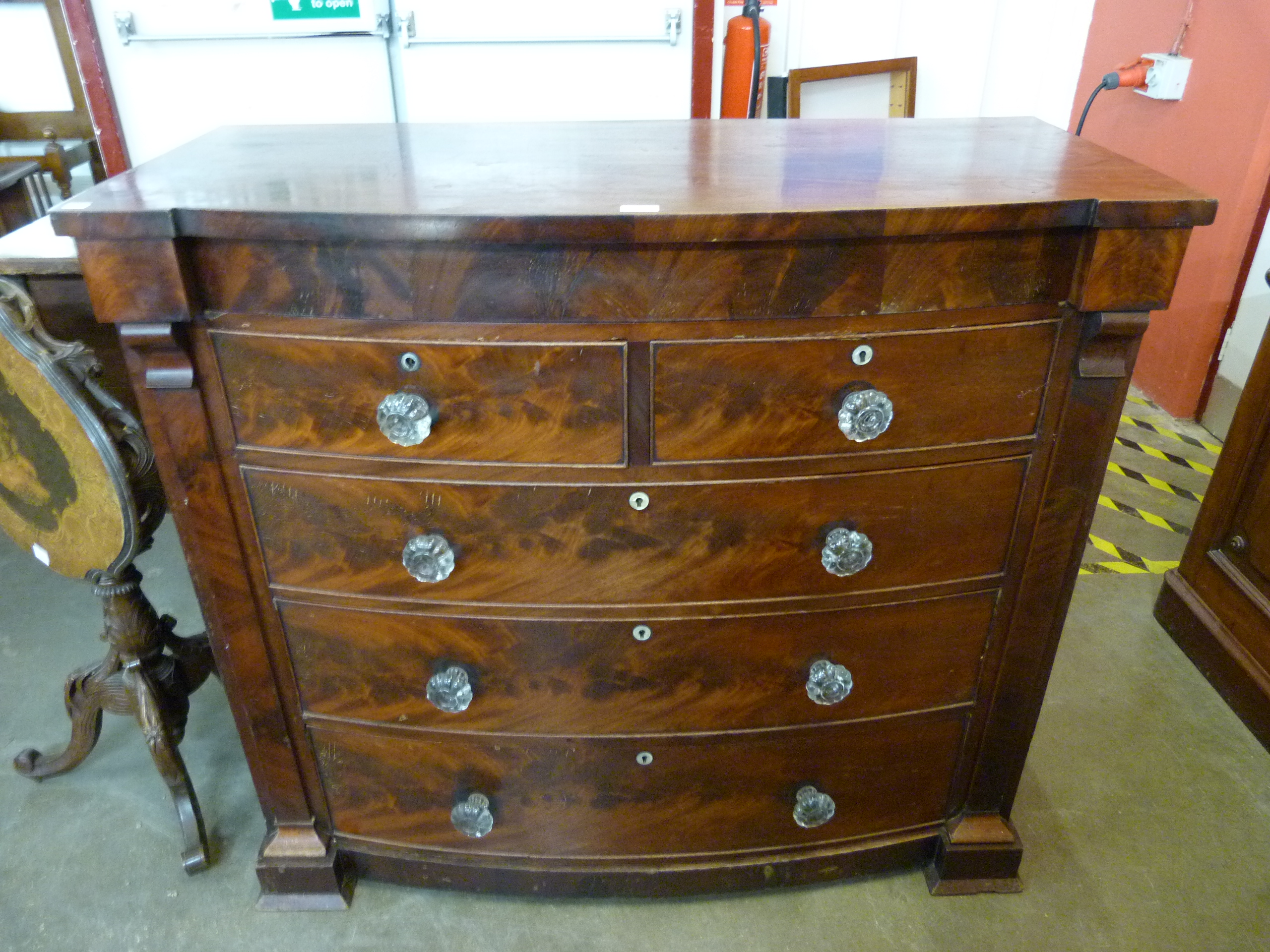 A Victorian mahogany bow front chest of drawers