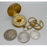 A 1901 India one Rupee coin, a South Africa 5 shillings coin, an 1890 florin and a compass with