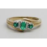 A 9ct gold, three green stone and six white stone ring, 2.9g, Q