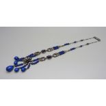 A vintage white metal mounted lapis lazuli necklace