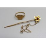 A small 9ct gold signet ring and a gold stick pin, 2.5g