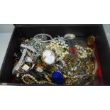 A collection of costume jewellery and wristwatches including vintage
