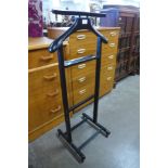 An ebonised gentleman's valet stand