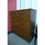 A Victorian scumbled pine chest of drawers
