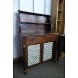 A Regency mahogany and gilt mounted side cabinet