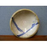 A blue and white glazed studio pottery bowl