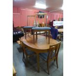 A Nathan teak extending dining table and a set of six G-Plan Fresco teak chairs