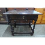 A William III oak single drawer side table