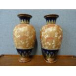 A pair of Royal Doulton stoneware vases ,a/f