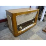 A vintage walnut Riviera valve radio