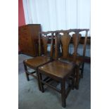A set of four George III Welsh provincial oak chairs