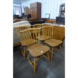 A set of Ercol Blonde elm and beech chairs